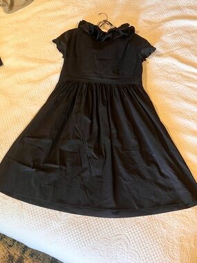 Maggy London Women’s Black Ruffle Collar Dress with pockets.